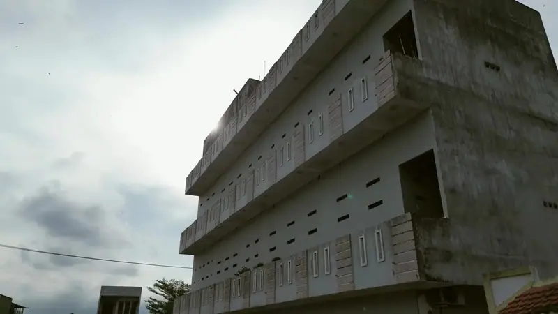 Drone view of a swiftlet house above the town